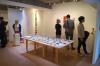 People in an art exhibition space.